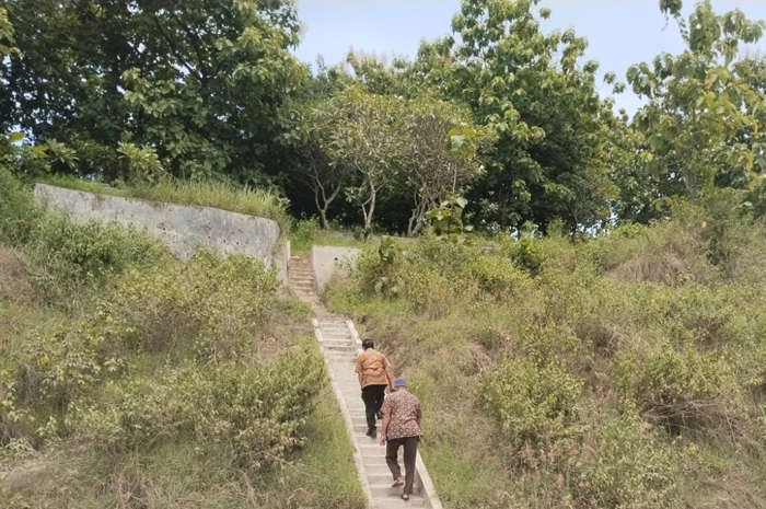 TINJAU: BPKAD Jombang meninjau lahan di Desa Karangpakis untuk pembangunan RTH.  &nbsp;