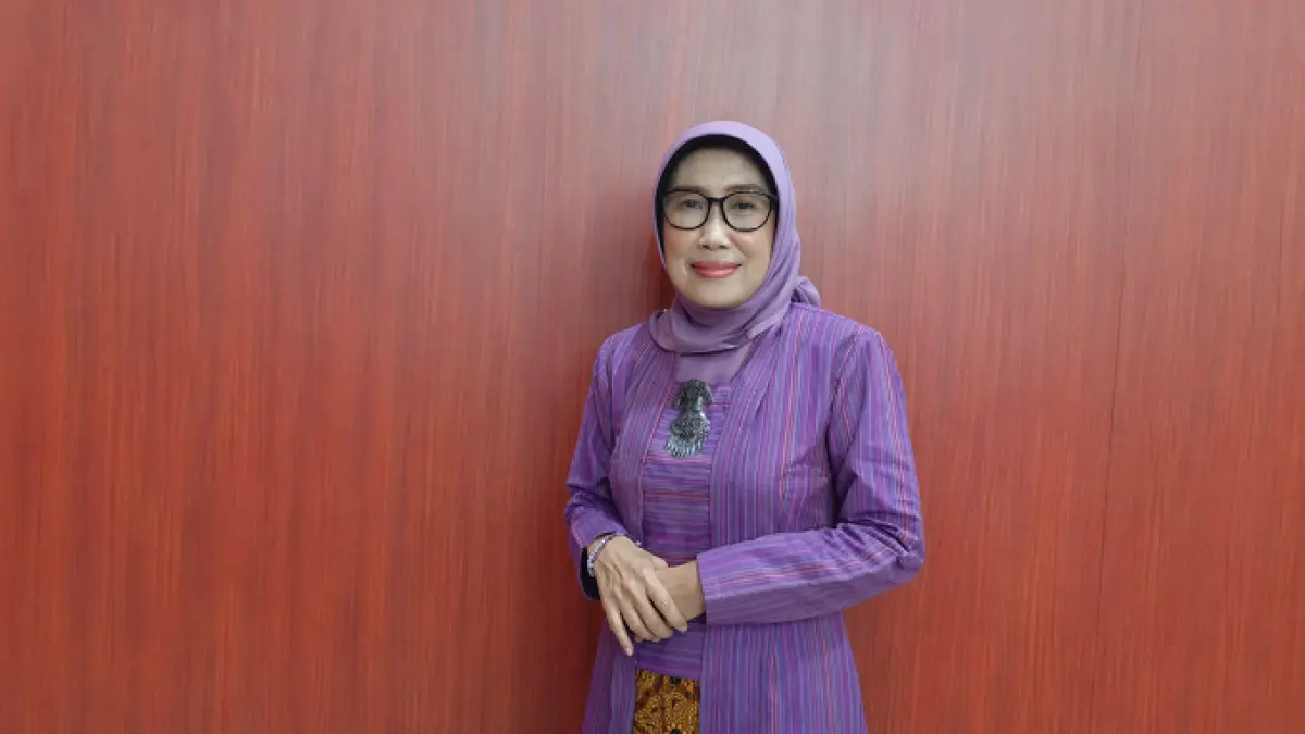 Dra. Wor Windari, M.Si, 