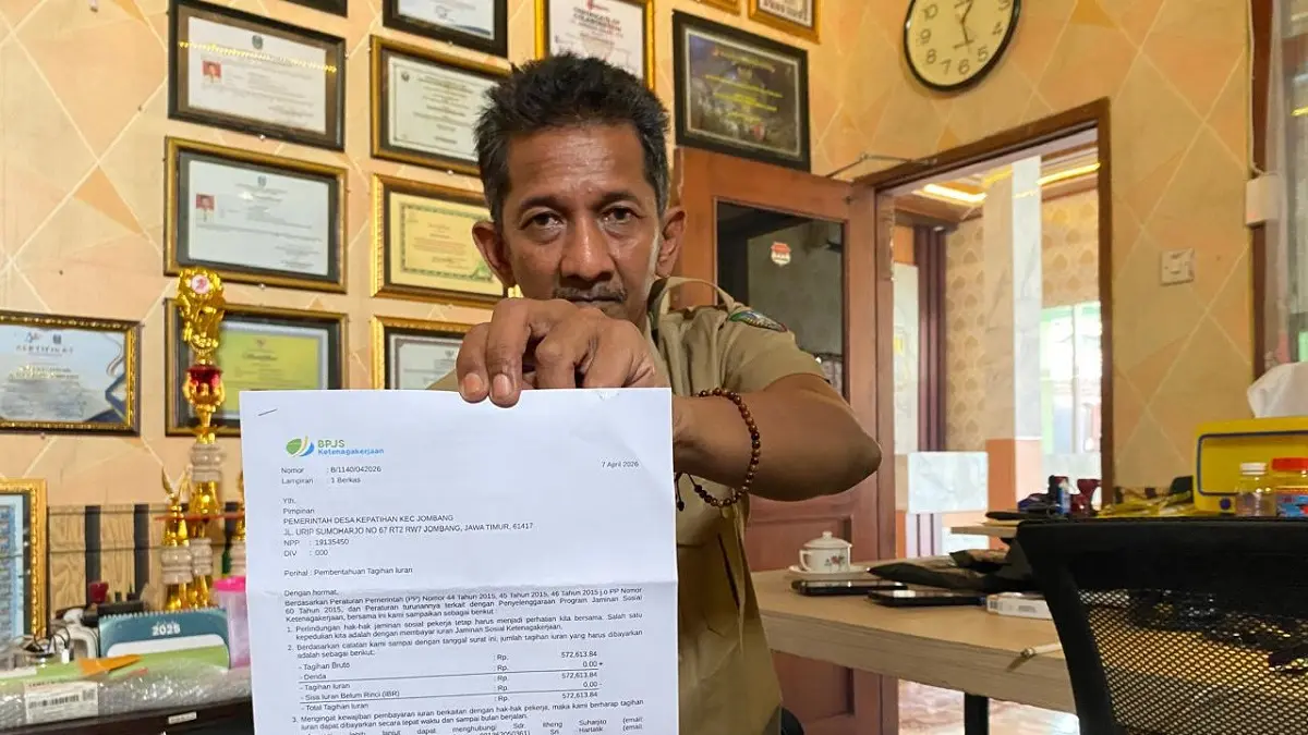 ROGOH KOCEK PRIBADI: Kepala Desa Kepatihan, Kecamatan Jombang, Erwin Pribadi merogoh kocek pribadi untuk membayar tunggakan BPJS perangkat desa. 