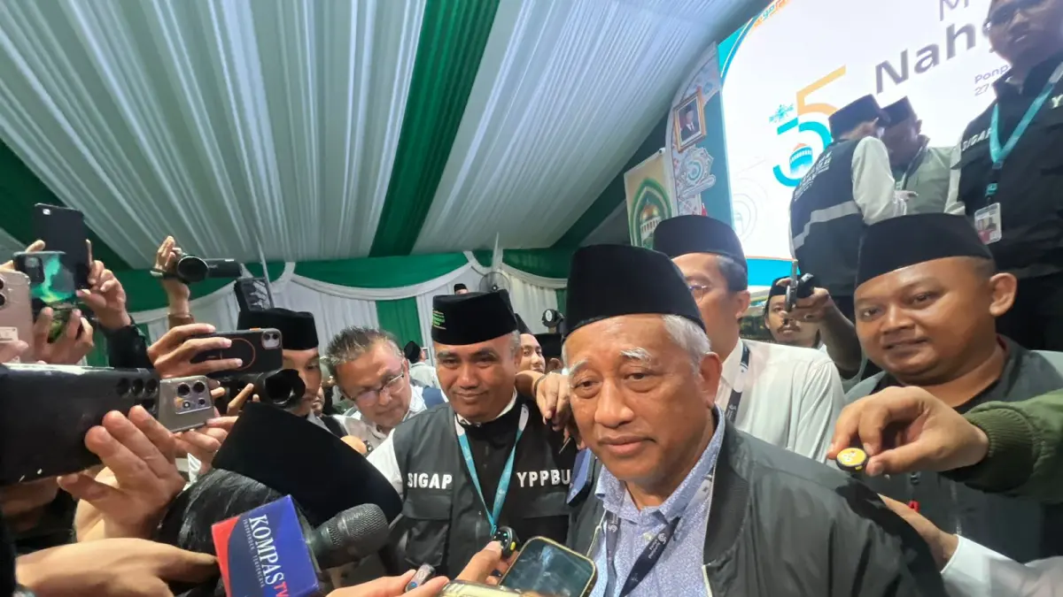 M Nuh, OC Muktamar ke-35 NU saat memberikan keterangan kepada awak media