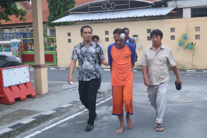 Yusuf Maarif saat digelandang ke Mapolres Jombang