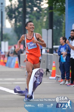Heri Priono saat mengikuti Setia Waspada Run tahun 2023 di Jakarta, (12/2)