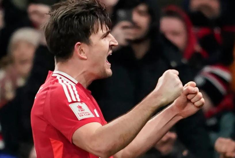 Harry Maguire saat berhasil mencetak gol