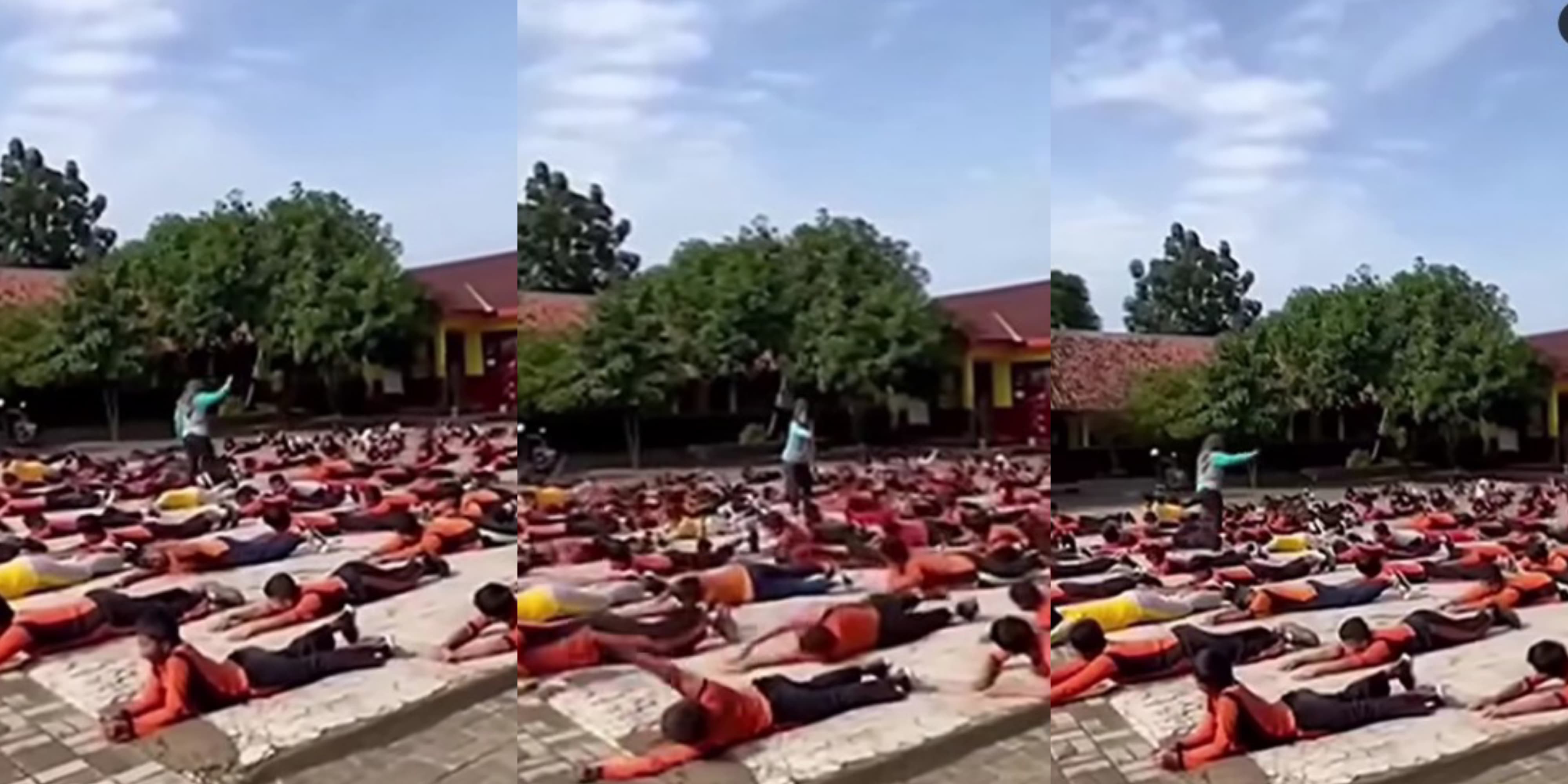 Tangkapan layar video yang viral menunjukkan siswa latihan renang di lapangan.