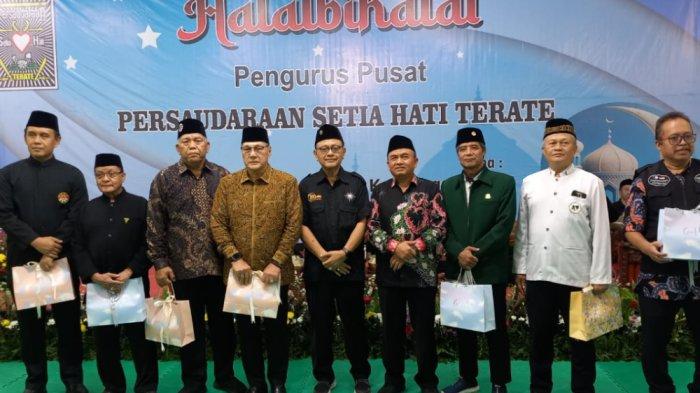 PSHT kepemimpinan Taufiq yang meminta mengakhiri dualisme kepengurusan.