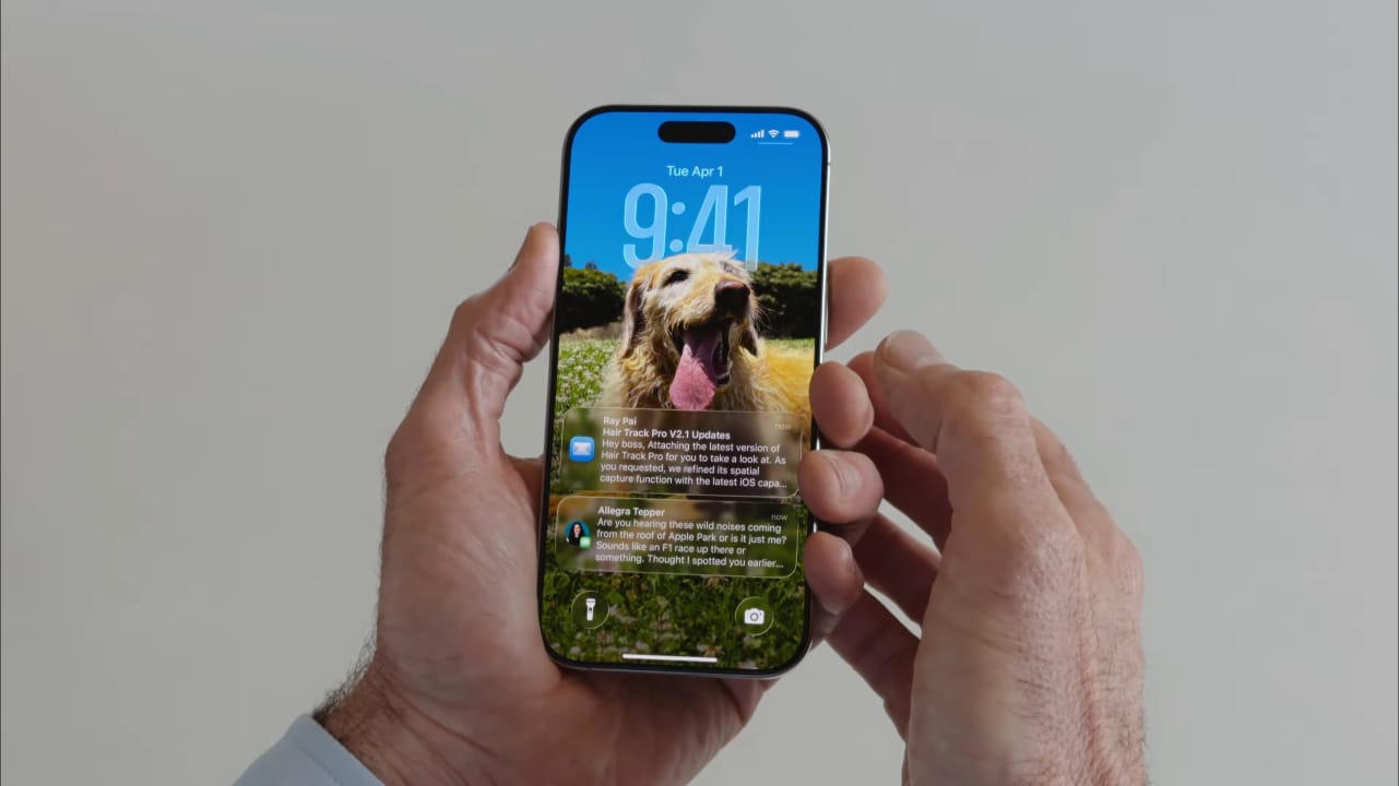 Tampilan layar kunci dan panel notifikasi iOS 26.