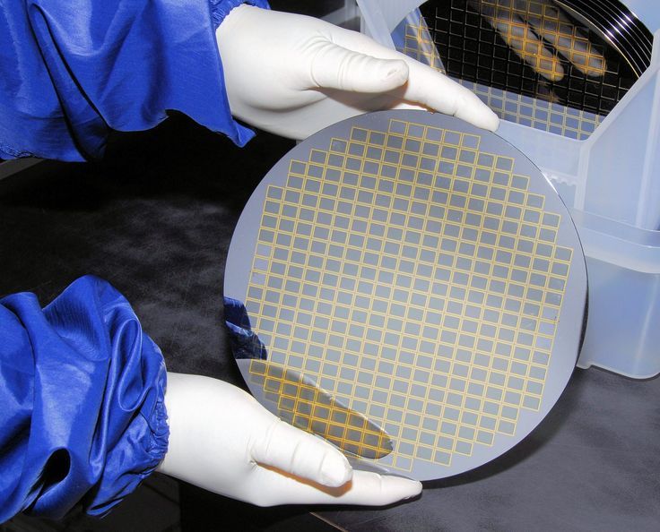 Ilustrasi wafer silikon yang akan digunakan untuk membuat chip.