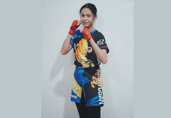 Ridha Arum Wijayanti, atlet wushu Kabupaten Tuban berbalut seragam tandingnya dalam ajang Porprov IX Jatim 2025.