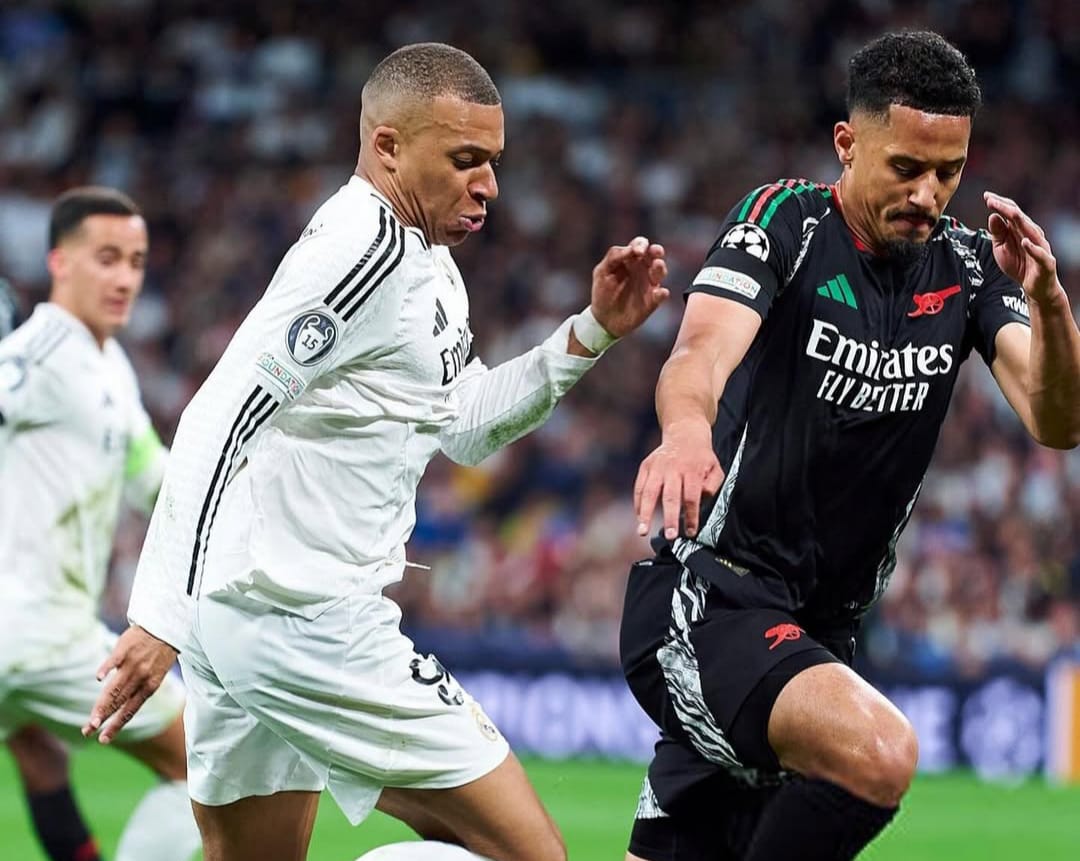 William Saliba saat berhadapan dengan pemain Real Madrid