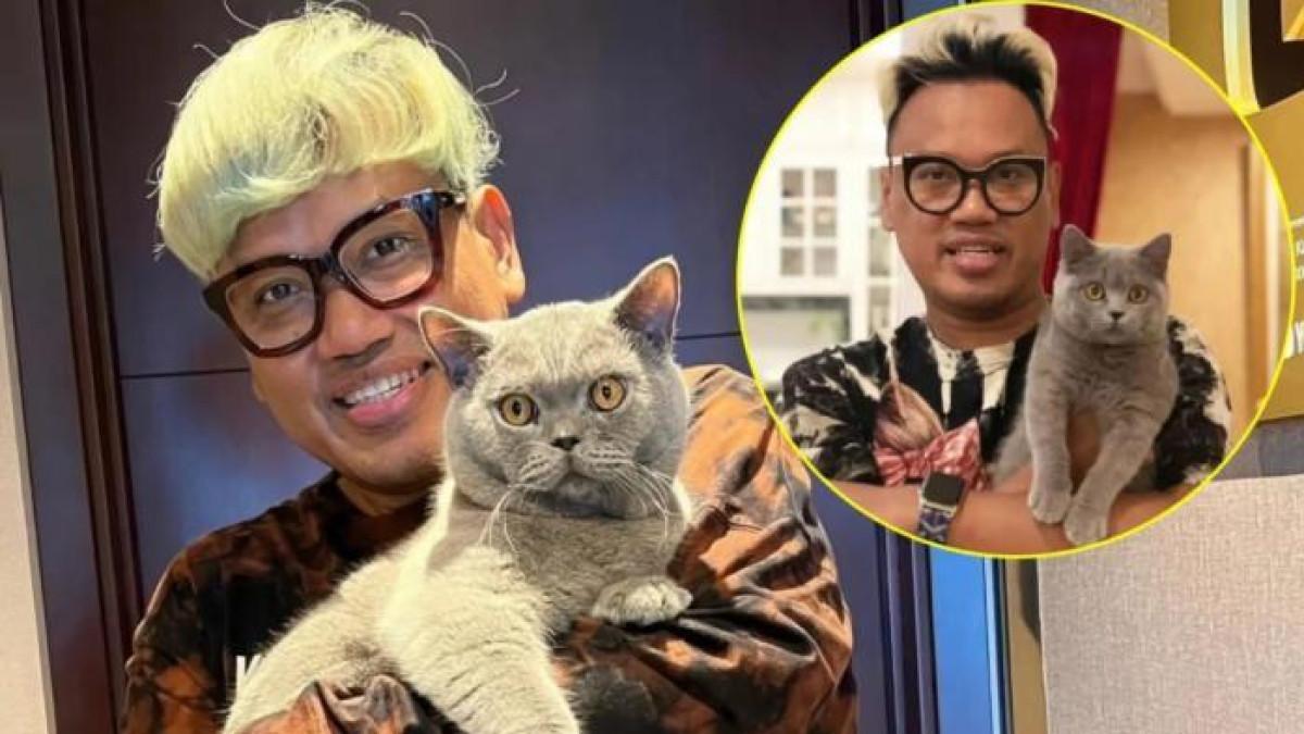 Foto Uya Kuya dengan kucingnya yang sempat dijarah massa