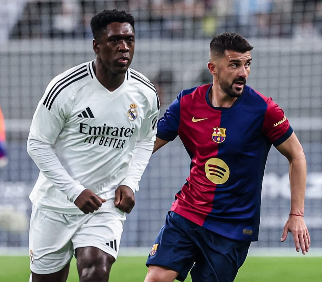 Ilustrasi Seedorf dan David Villa di laga El Clasico 2024 lalu.