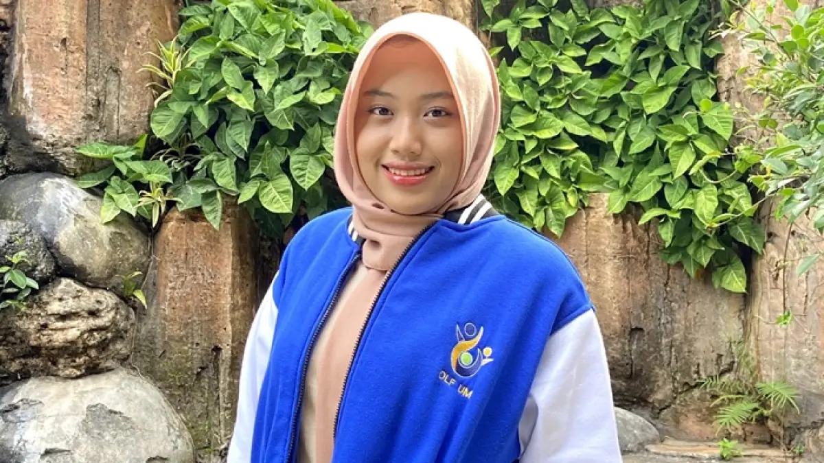 Fara dalam balutan jaket OLF Universitas Negeri Malang. (FARA AMELIA UNTUK RADAR TUBAN)