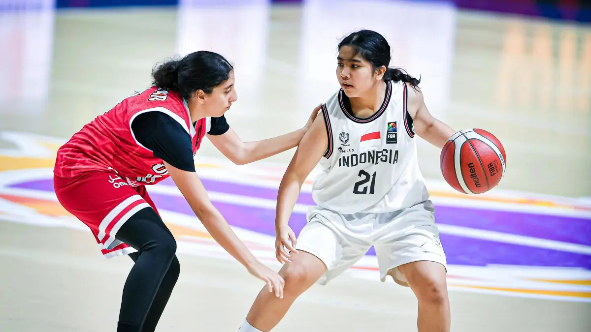 Timnas Basket Putri U-18 Indonesia mencetak kemenangan fantastis 127-6 atas Oman. (FIBA Basketball)