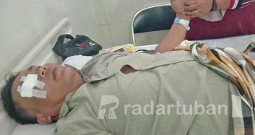 KORBAN KEBRUTALAN: Seorang pesilat yang jadi korban pelemparan oknum pesilat perguruan lain di Desa Kedungjambe, Kecamatan Singgahan.
