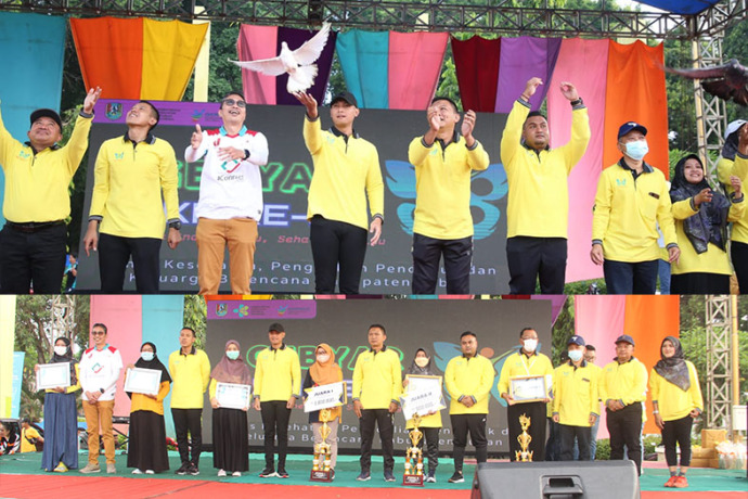 MEMBANGGAKAN: Mas Lindra pose bersama pemenang lomba inovasi pelayanan kesehatan Dinkes PPKB Tuban. Foto atas, Mas Lindra bersama bersama forkopimda melepas burung dara sebagai simbolis puncak acara HKN sekaligus harapan Tuban bebas dari stunting.