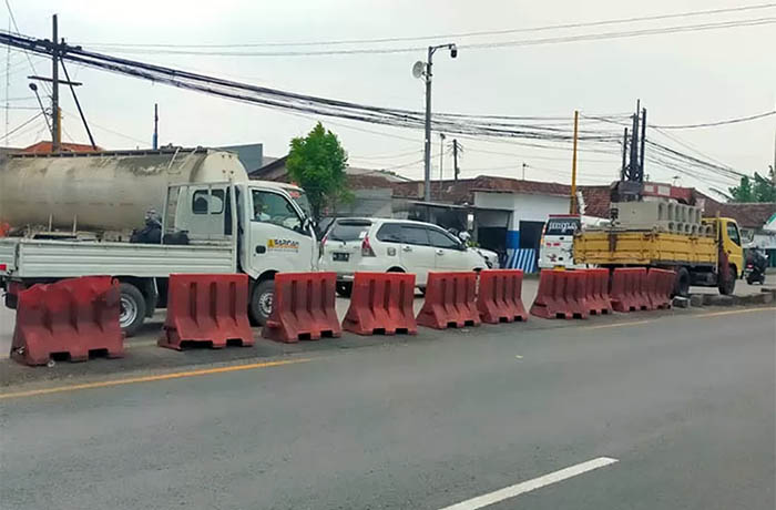 MASIH DITUTUP: Simpang empat Kejapanan yang direncanakan bakal dibuka kembali.