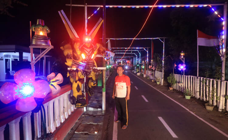 MASA DEPAN: Ornamen robot yang ada di Gang Bayusari. (Zainal Arifin/Radar Bromo)
