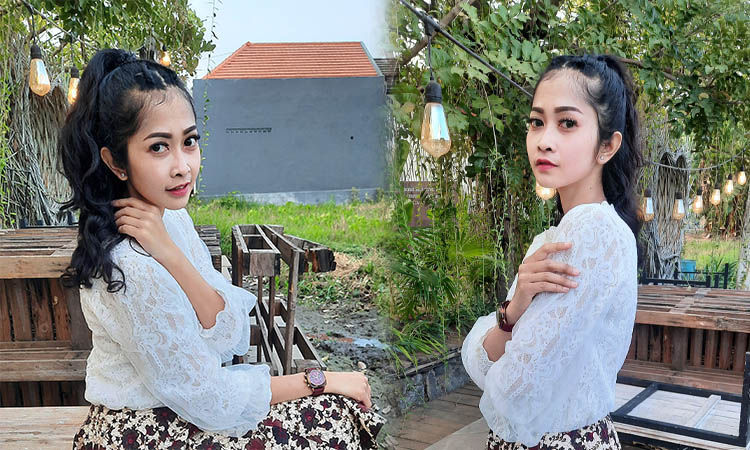 TAMPIL MENAWAN: Yurike Evriliya dengan model rambut half pony tail.