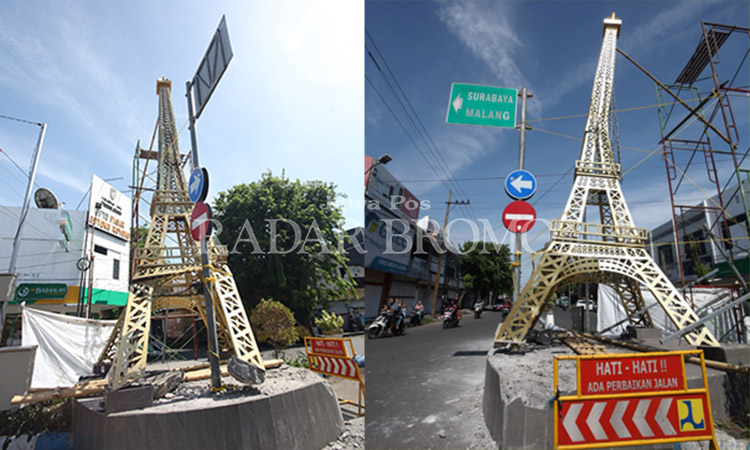 MIRING: Miniatur Menara Eiffel di simpang tiga King, Jalan Panglima Sudirman, Kota Probolinggo setelah ditabrak truk, Sabtu (20/1) malam. Kerangka menara jadi miring.