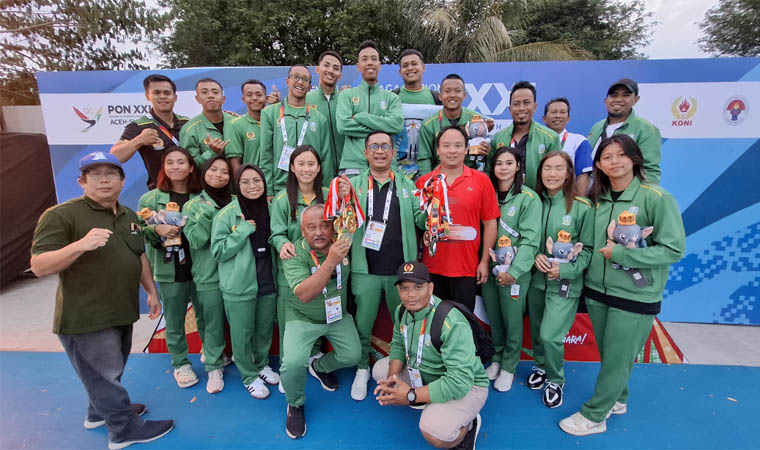 DULANG MEDALI: Atlet selam Kabupaten Pasuruan yang tergabung dalam POSSI Jatim meraih gelar juara umum.