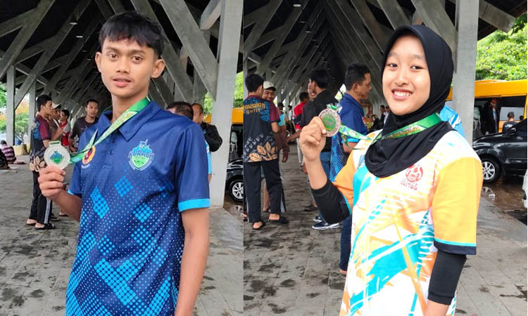 MEMBANGGAKAN: Herlina dan Lukman Hakim yang berhasil meraih medali.