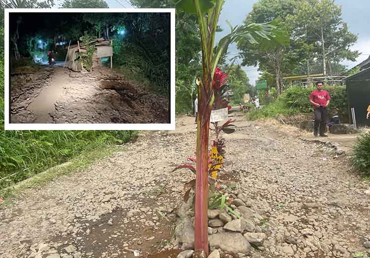 RUSAK: Ruas jalan Krucil-Bermi yang mengalami kerusakan. Hal itu memicu protes warga yang akhirnya memilih untuk memasang kuburan palsu dan warung di tengah jalan.