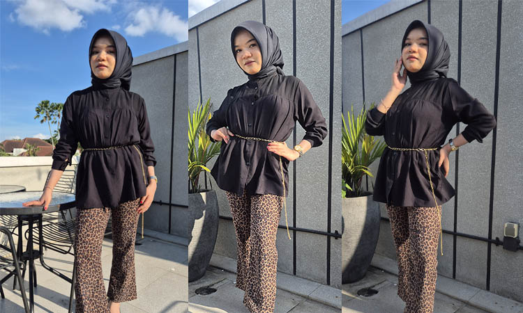 ELEGAN: Risa Lidia tampil mengenakan celana leopard yang dipadukan dengan blouse warna hitam. Kesan seksi, menarik dan elegan, menyatu saat memakai outfit ini.
