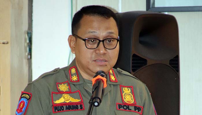 LAPORAN: Kepala Satpol PP Kota Probolinggo Pujo Agung Satrio, S.STP., M.Si. menyampaikan laporan kegiatan sosialisasi.