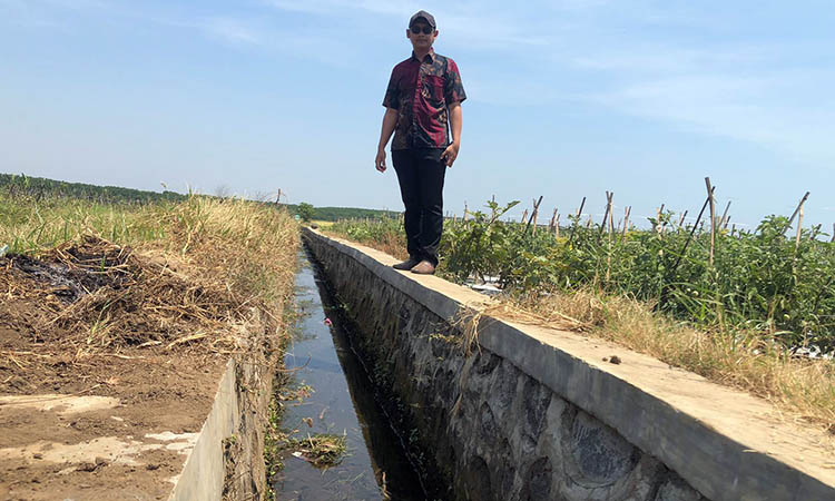 KOKOH: Saluran irigasi yang telah dibangun di Dusun Melati RT 10, Desa Pesisir, Kecamatan Sumberasih, Kabupaten Probolinggo.