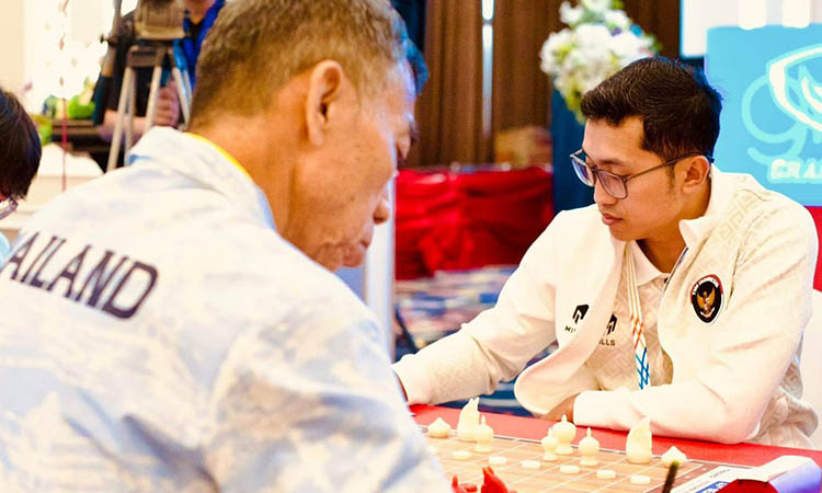 LAWAN TUAN RUMAH: Moh Ervan ketika berlaga di Sea Games Thailand beberapa waktu lalu.