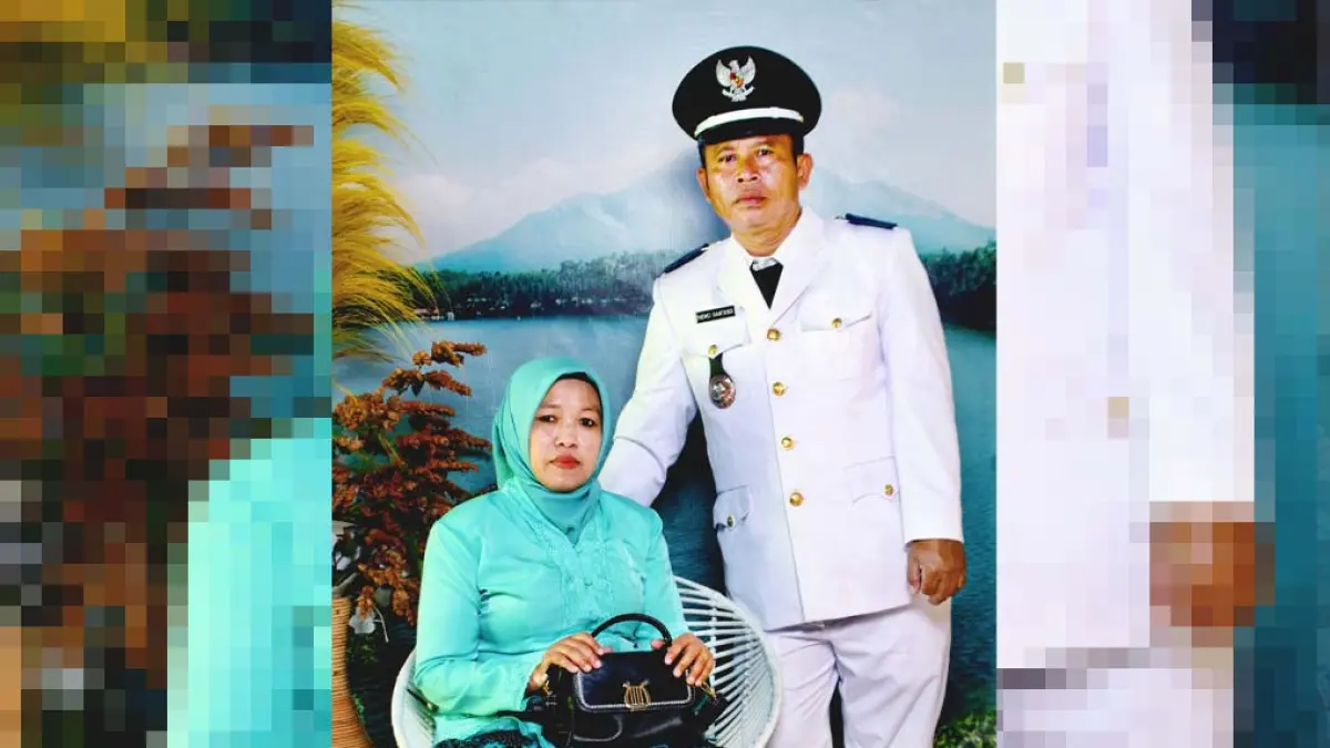 MENGABDI: Kepala Desa Andungsari Nemo Santoso berfoto bersama istri. (Pemdes Andungsari For Jawa Pos Radar Bromo)