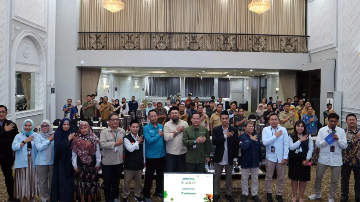 KOMPAK: Kepala KPwBI Malang Indra Kuspriyadi bersama para undangan dan peserta pelatihan berfoto bersama.