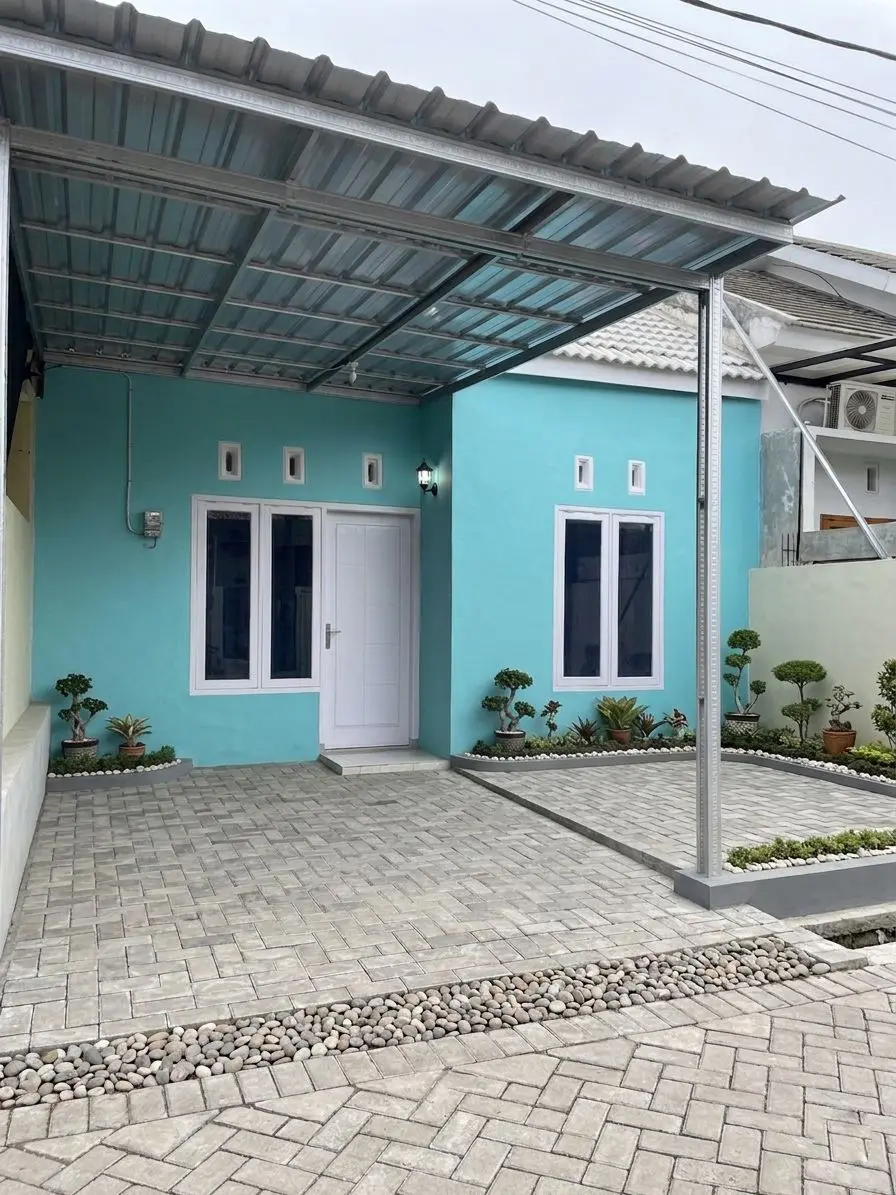 SUBSIDI: Rumah subsidi di PT KCS dilengkapi kanopi garasi, pagar kanan-kiri, hingga dapur tertutup.