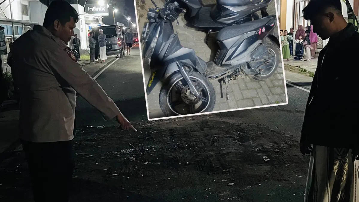 TKP: Petugas menunjukkan lokasi tabrakan maut di Tutur, Kabupaten Pasuruan. 