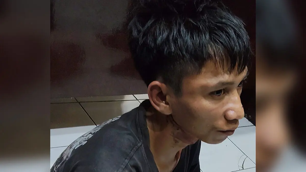 DIAMANKAN: Tersangka Wahyudi saat diamankan polisi.