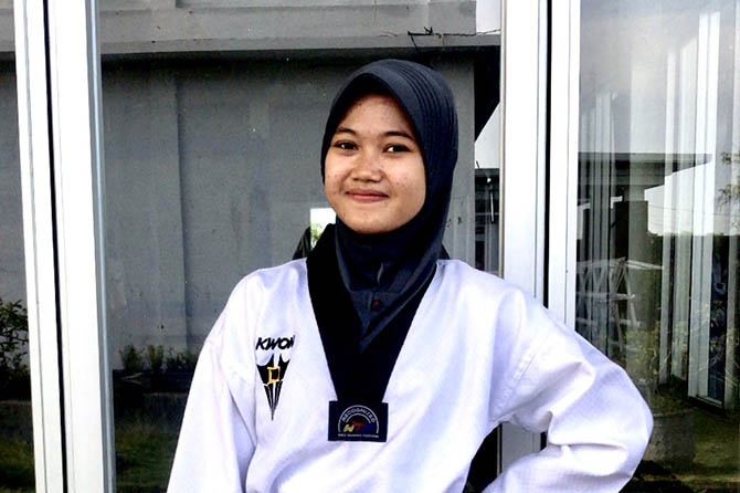 INCAR MEDALI: Siti Aisyah, atlet taekwondo andalan Kabupaten Probolinggo yang bakal turun di PON XX Papua mendatang. (Dok. Pribadi)