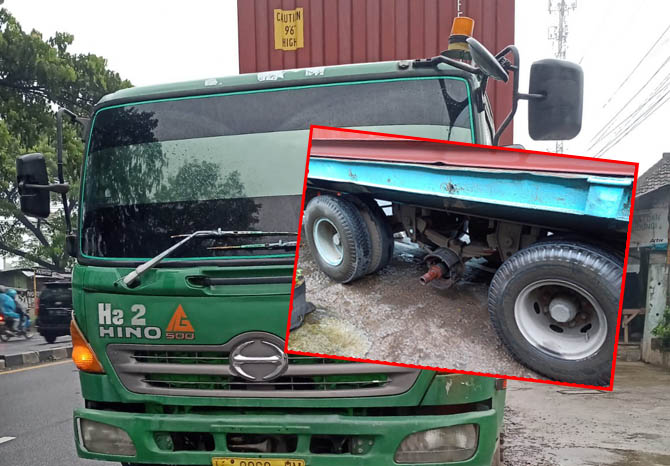 BERHENTI: Truk kontainer yang bannya lepas di Sukorejo. (Foto: Rizal F. Syatori/Jawa Pos Radar Bromo)