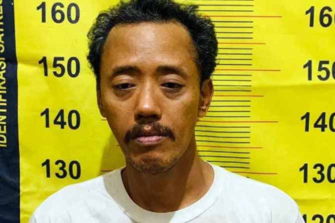KEPALA EMPAT: Eko Wahyudi yang kini mendekam di jeruji tahanan. Pada 24 Agustus nanti sejatinya dia akan berulang tahun ke 45. (Foto: Polres Pasuruan for Jawa Pos Radar Bromo)