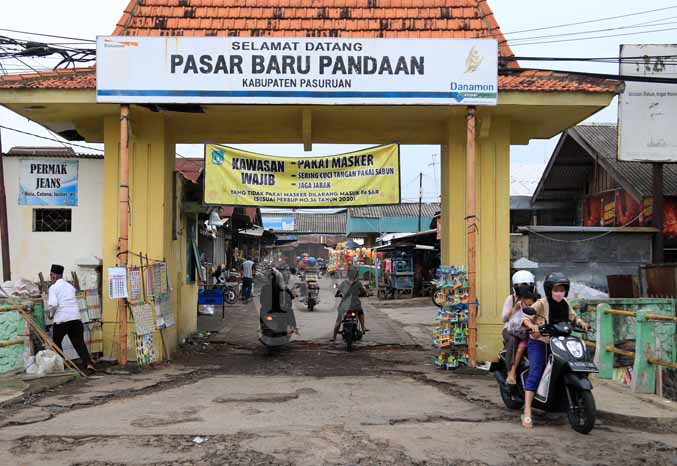 POTENSIAL: Suasana Pasar Pandaan saat pagi. Sejumlah pasar daerah di Kabupaten Pasuruan menjadi sumber pemasukan. (Foto: Dok. Radar Bromo)