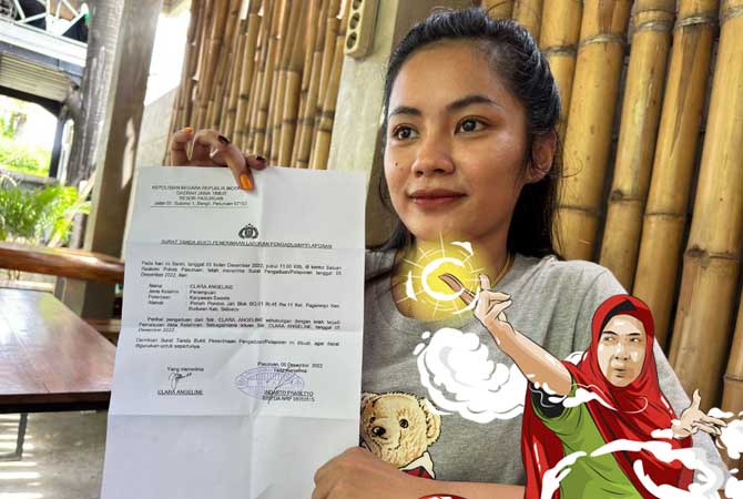 Clara saat menunjukkan surat laporan polisi.