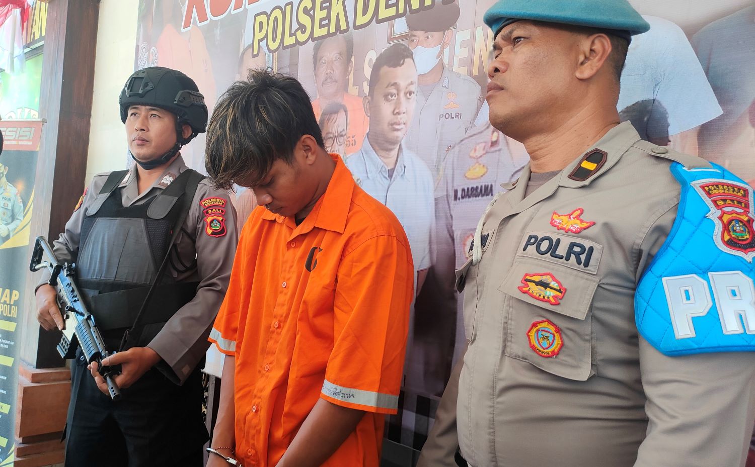 Ketut Artawan hanya bisa tertunduk lesu di Mapolsek Denpasar Timur, Denpasar, Bali setelah ditangkap lagi karena kembali melakukan pencurian.