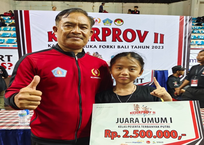 Salah satu Karateka Garuda Emas, Anak Agung Istri Laksmi Pujantari atau yang lebih akrab disapa Gung Ami berhasil meraih 2 medali Emas yakni di nomor Kata dan Kumite kategori Pra Pemula Putri.