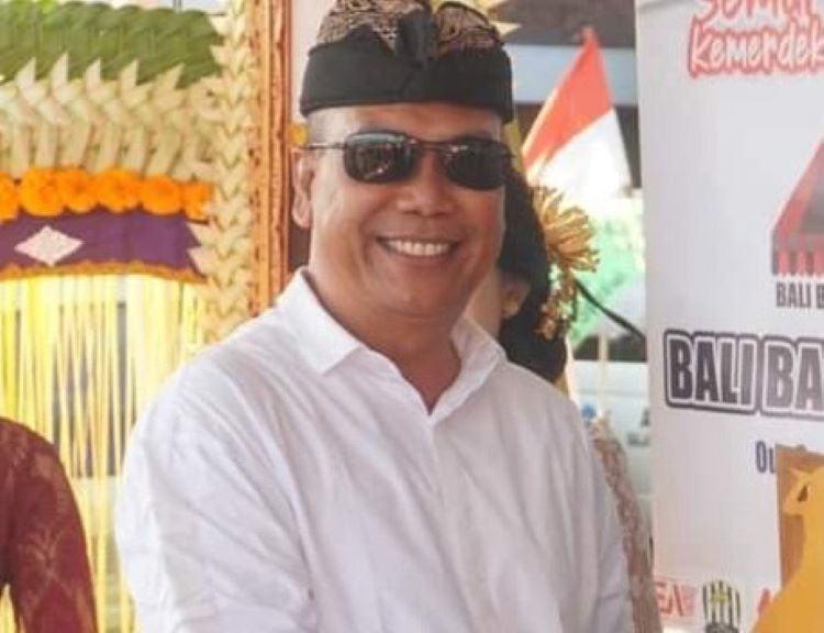 Perbekel Desa Tibubeneng I Made Kamajaya&nbsp; bicara soal simbiomasi.