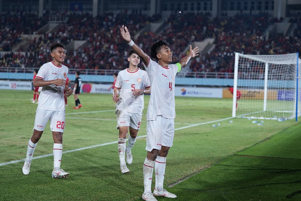 Putu Panji Apriawan usai cetak gol saat Timnas Indonesia U16 Vs Laos di Piala AFF U16.