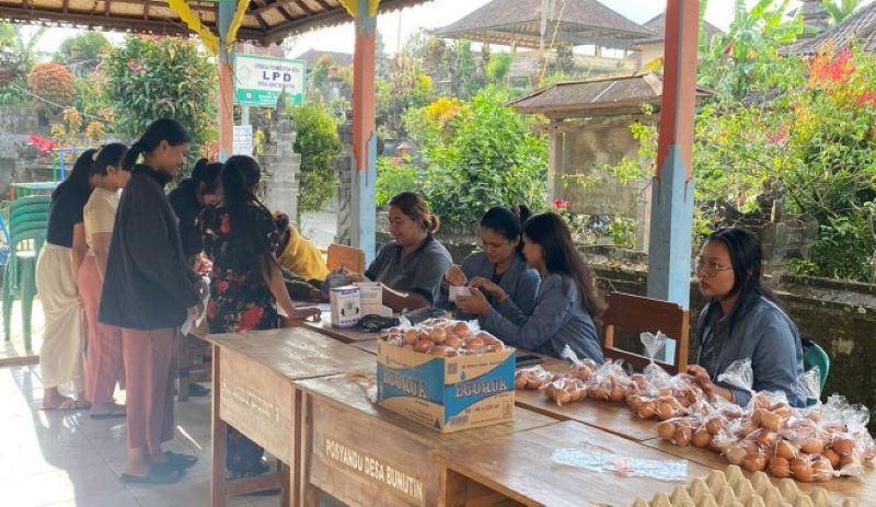 Kegiatan posyandu di Desa Bunutin, Kecamatan Kintamani, Kabupaten Bangli, Bali pada Juli 2024.
