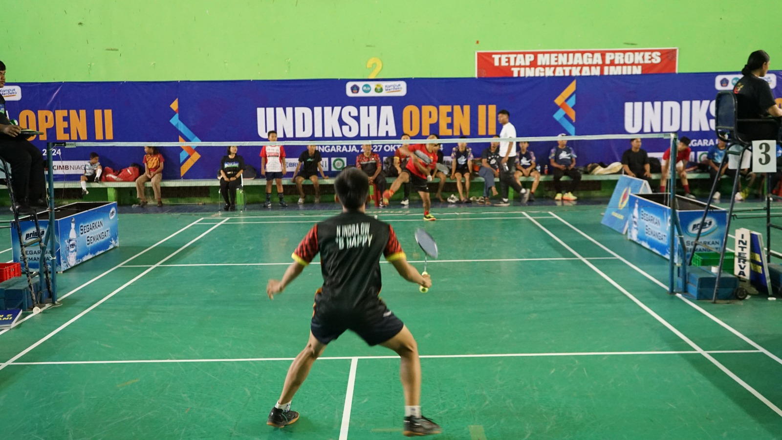 Pertandingan Bulutangkis pada Kejuaraan Undiksha Open 2024.