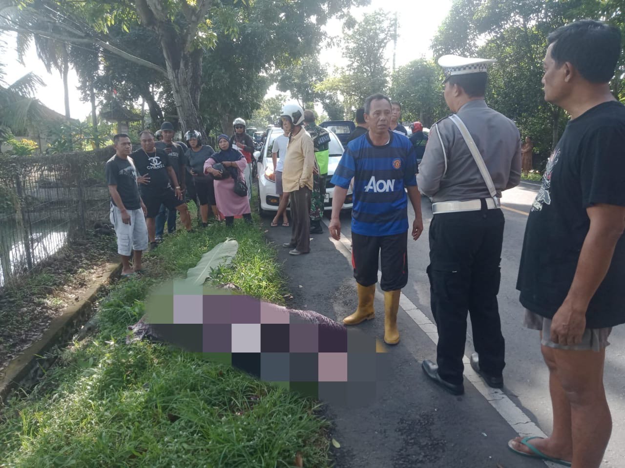 Kondisi kendaraan yang terlibat lakalantas di Jalan Denpasar-Gilimanuk KM 89-90, Desa Pohsanten, Kecamatan Mendoyo, Jembrana, Minggu (19/1/2025). (istimewa)