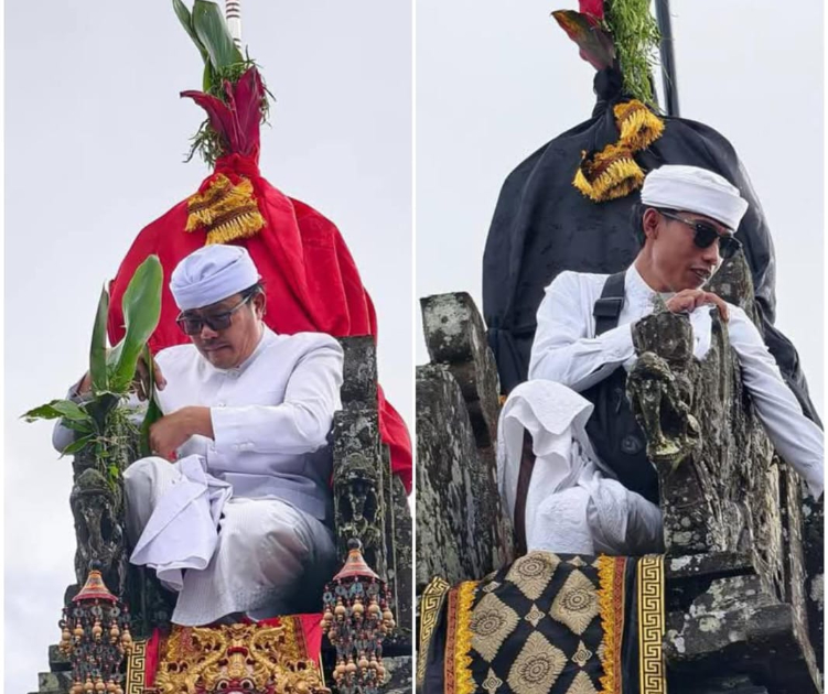 Sejumlah jro mangku memasang busana di palinggih di Pura Besakih
