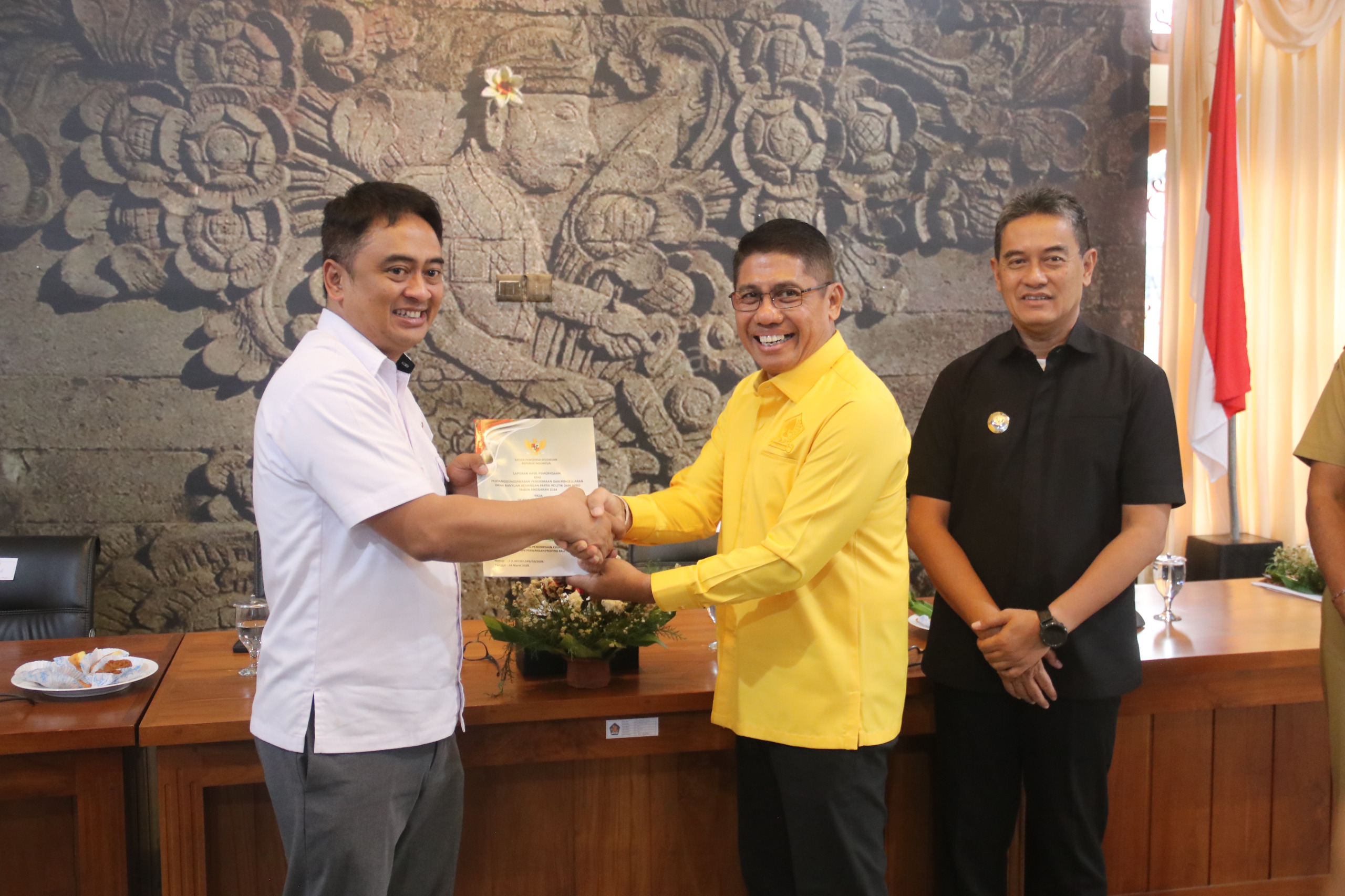 Penyerahan Laporan Hasil Pemeriksaan (LHP) Bantuan Keuangan Partai Politik Tahun Anggaran 2024.