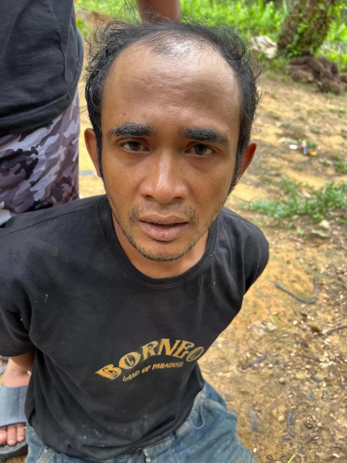 BURONAN: Ahmad Midhol ditangkap di kawasan kebun sawit Kalimantan Tengah.